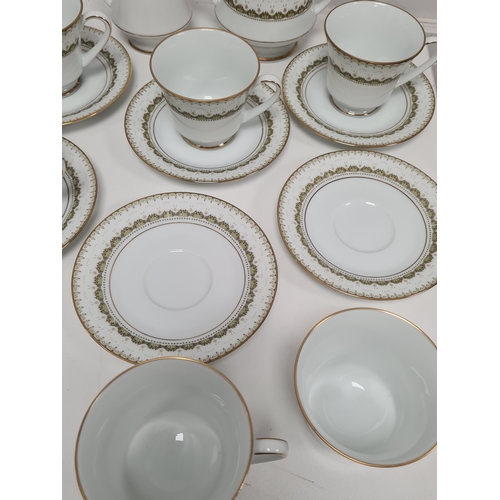 528 - Japanese Noritake Katrina Tea Set 2254 to include 6 cups, 6 saucers, milk jug and lidded sugar pot.