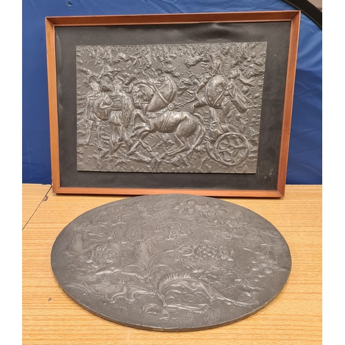 556 - 2 vintage Embossed Pewter wall hangings. Included are an Arts & Crafts round floral 43.5cm in diamet... 