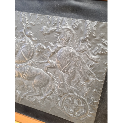 556 - 2 vintage Embossed Pewter wall hangings. Included are an Arts & Crafts round floral 43.5cm in diamet... 