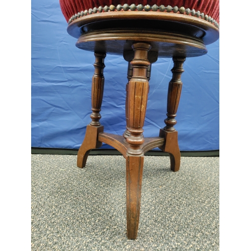 558 - Velvet topped piano stool with threaded seat. H 50cm x 36cm.