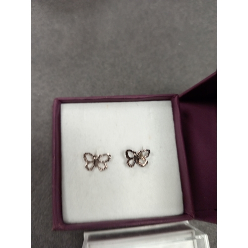 660 - Two pairs of 925 silver stud butterfly earrings boxed one with diamanté stones