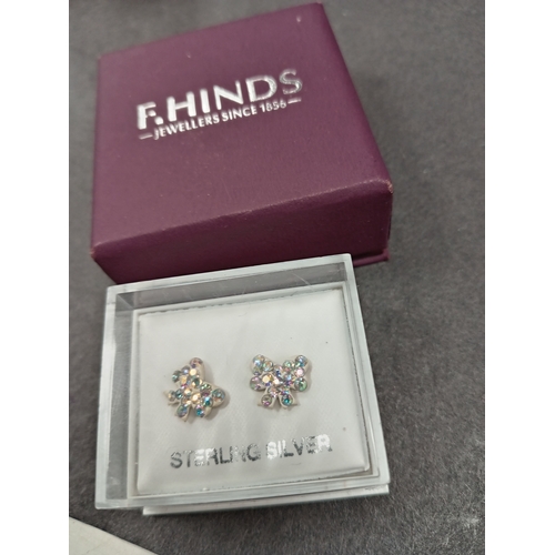 660 - Two pairs of 925 silver stud butterfly earrings boxed one with diamanté stones