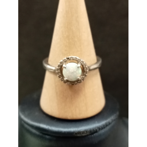 671 - 925 silver opal and diamanté stone ring, missing one stone size Q