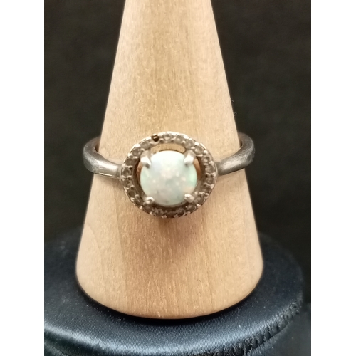 671 - 925 silver opal and diamanté stone ring, missing one stone size Q