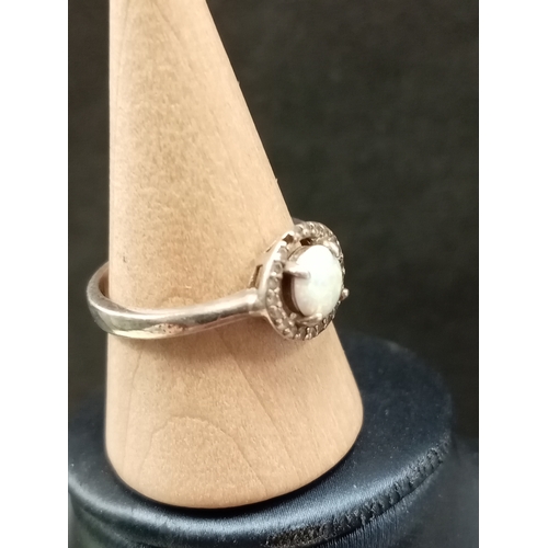 671 - 925 silver opal and diamanté stone ring, missing one stone size Q