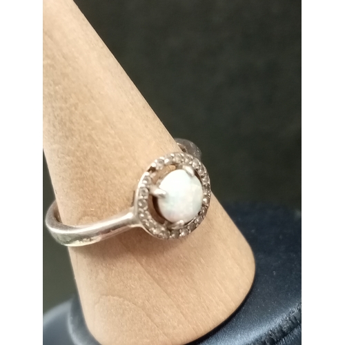 671 - 925 silver opal and diamanté stone ring, missing one stone size Q