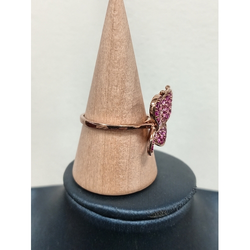 690 - 9ct gold butterfly ring with rubies size Q weight 3.48 grams