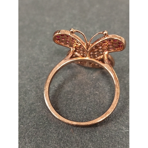 690 - 9ct gold butterfly ring with rubies size Q weight 3.48 grams