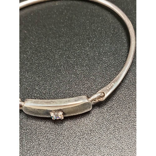 728 - 925 silver bangle with diamanté stone clasp detail 7cm diameter