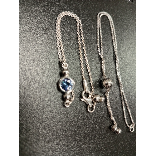 731 - Two 925 silver bracelets, one with blue stone and one adjustable bracelet