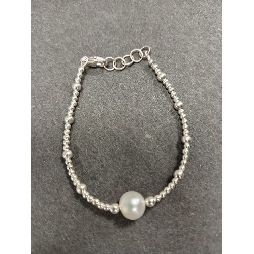 745 - 925 silver christening faux pearl bracelet 8cm