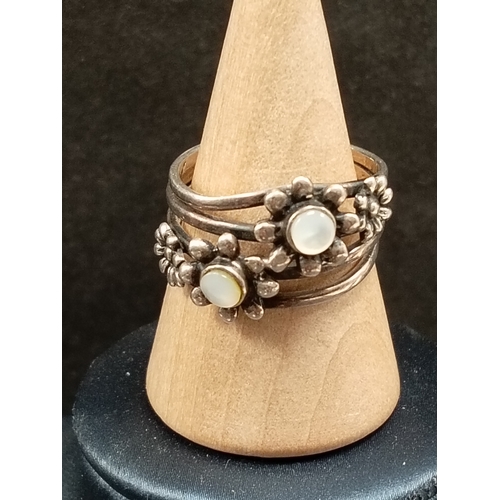 750 - 925 silver flower and Pearlescent stone ring size O