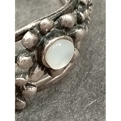 750 - 925 silver flower and Pearlescent stone ring size O