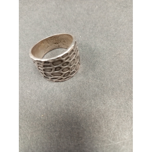 756 - White metal large hammered effect ring size Q