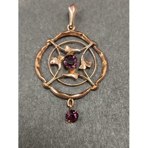 762 - Yellow metal lavalier pendant with purple stones