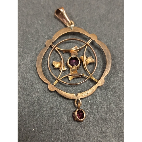 762 - Yellow metal lavalier pendant with purple stones