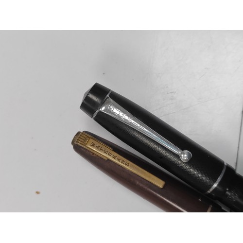 582 - Two 14ct gold nibbed fountain pens. One summit and one watermans.