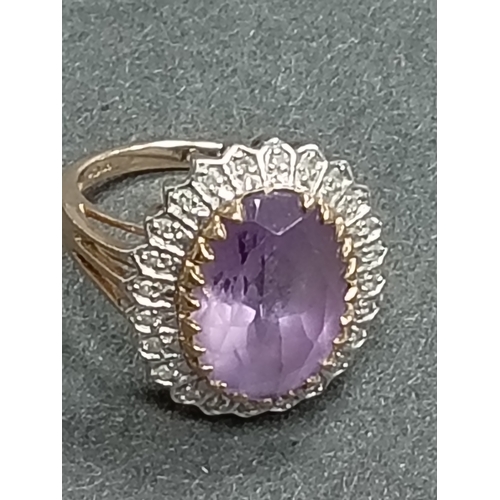 765 - 9ct gold Diamond and Amethyst large statement piece ring size K weight 4.8