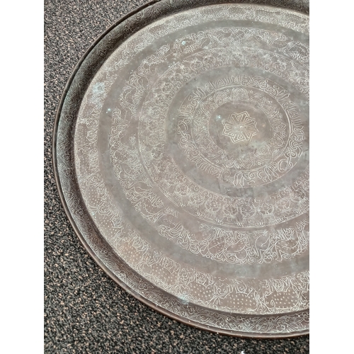 403 - Large engraved brass tray measures 56cm diameter