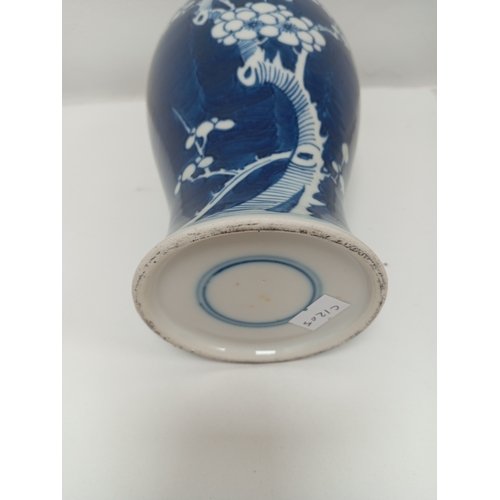 405 - Oriental Chinese blue and white prunus vase H 25cm x W 12cm