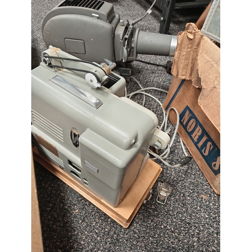 424 - Two vintage projectors, German Noris projection in a carry case A/F and a German Prado Leitz wetzler... 