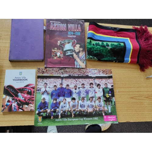 445 - A job lot of Aston villa memorabilia. To include 3 books, a poster and a villa park tapestry