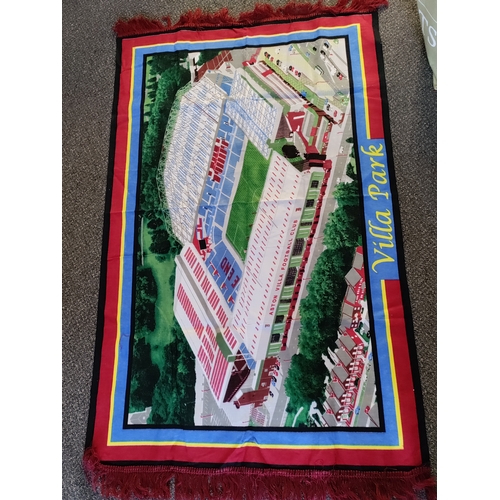 445 - A job lot of Aston villa memorabilia. To include 3 books, a poster and a villa park tapestry