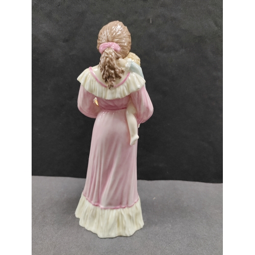 448 - 1990 Royal Worcester figure of a woman reading to a child titled 