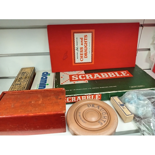 454 - Job lot of vintage games including scrabble, dominoes, chess, draughts and poker dice.