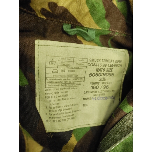 461 - A job lot of military gear. To include 2 camouflage jackets, 3 webbing vests, 1 camouflage vest, 1 s... 