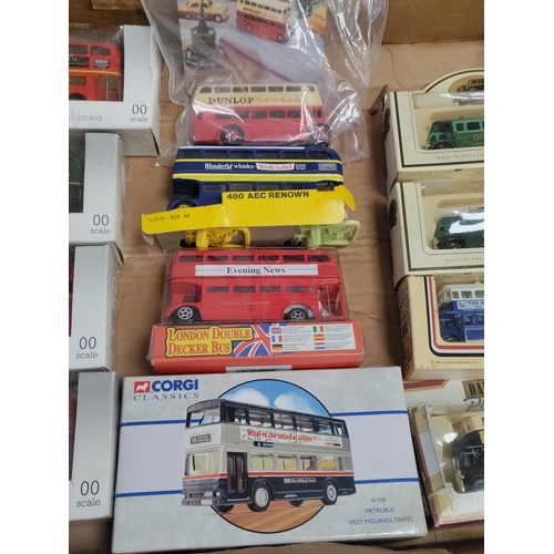 467 - A job lot of EFE 00 Scale, Lledo, Corgi, Dinky and days gone mostly boxed Buses.