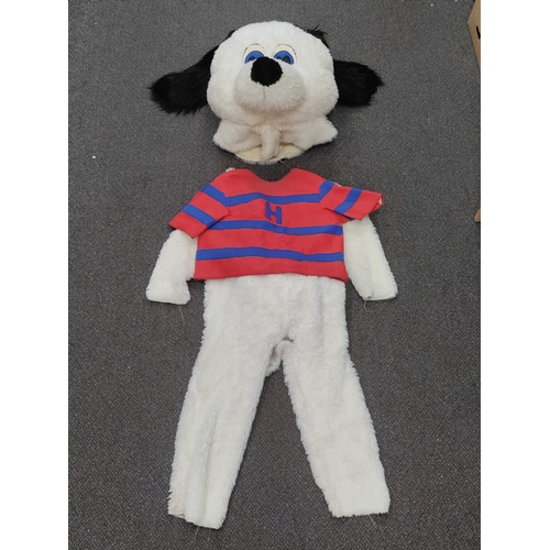 416 - Black and white dog mascot outfit with a blue and red vest. H 144cm x W 90cm