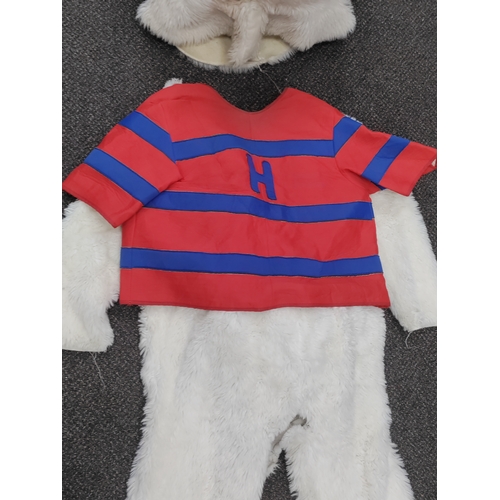 416 - Black and white dog mascot outfit with a blue and red vest. H 144cm x W 90cm