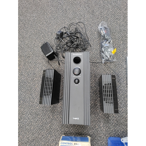 422 - Silver PS2 console with all necessary cables and a boxed sound station 2 aftermarket speaker set. Al... 