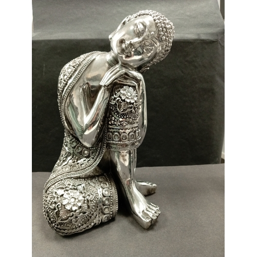 427 - Silver resin sleeping Buddha with flower and mirror detail clothing. H 36cm x W 20cm