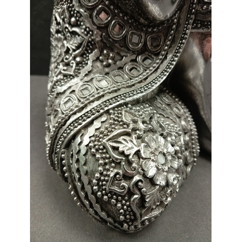 427 - Silver resin sleeping Buddha with flower and mirror detail clothing. H 36cm x W 20cm