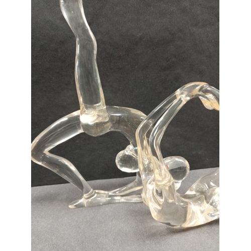 430 - Two clear Acrylic female ballet figures. H 27cm x W 14cm and H 14cm x W 14cm