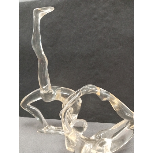 430 - Two clear Acrylic female ballet figures. H 27cm x W 14cm and H 14cm x W 14cm