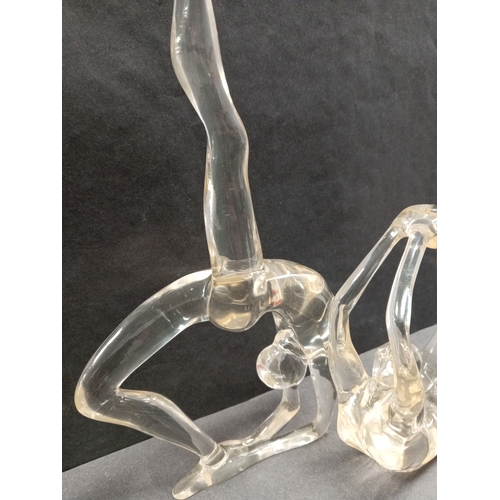 430 - Two clear Acrylic female ballet figures. H 27cm x W 14cm and H 14cm x W 14cm