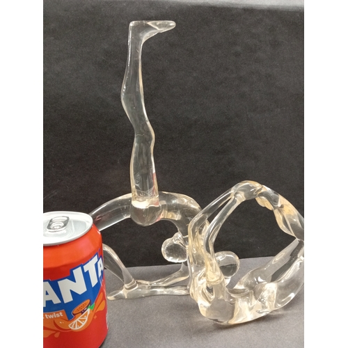 430 - Two clear Acrylic female ballet figures. H 27cm x W 14cm and H 14cm x W 14cm