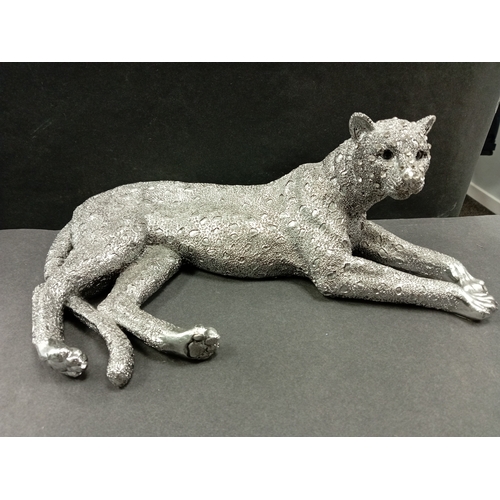 431 - Silver coloured cheetah with diamanté face resin figure. H 14cm x W 31cm