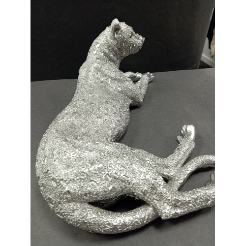 431 - Silver coloured cheetah with diamanté face resin figure. H 14cm x W 31cm