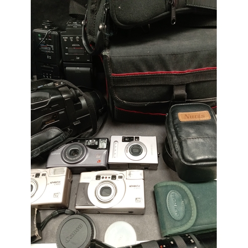 436 - Job lot of cameras, camera bags, video camera's, carry cases, flashes and lens. Includes Kodak, Pent... 