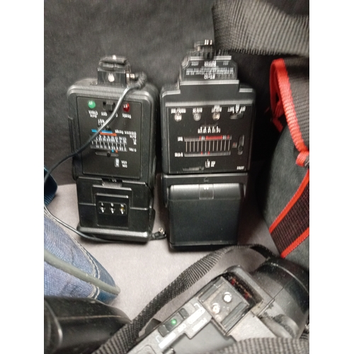 436 - Job lot of cameras, camera bags, video camera's, carry cases, flashes and lens. Includes Kodak, Pent... 