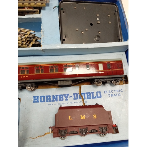 438 - Hornby Dublo Electric Train set in original box. Made in England by Mecca no limited.