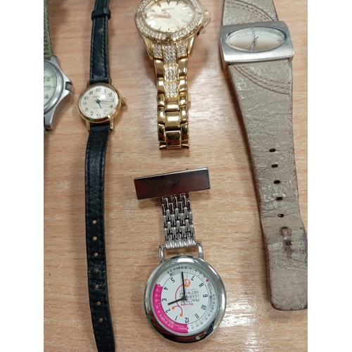 654 - Job lot of vintage watches includes Nurse's brooch watch, Lorus Disney watch, Lorus sports, Sekonda,... 