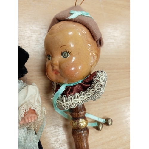 446 - Rare vintage hand painted ceramic head baby rattle H 23cm x W 6cm and two vintage hand painted dolls... 