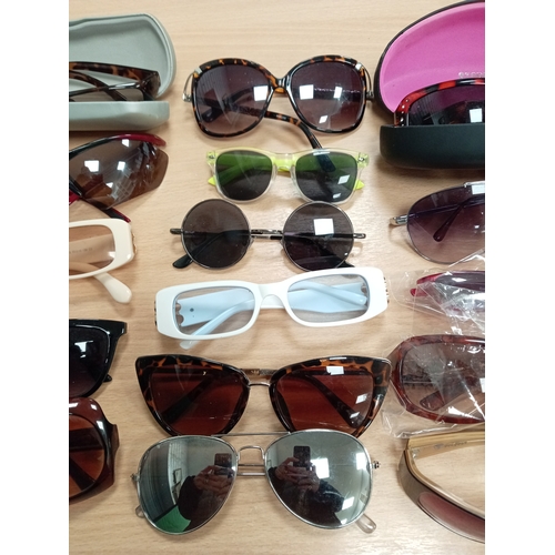 451 - Job lot of vintage sunglasses to include Storm sunglasses in original case and Fat Face sunglasses.