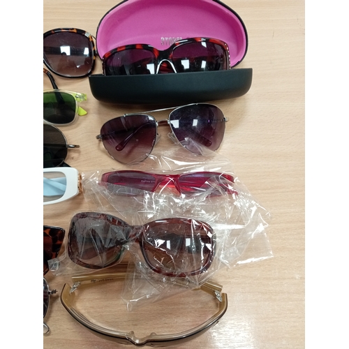 451 - Job lot of vintage sunglasses to include Storm sunglasses in original case and Fat Face sunglasses.