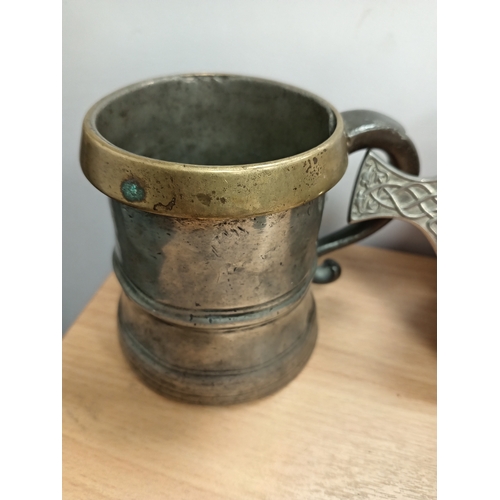 452 - Silver plated tankard, Pewter and brass rimmed tankard and a Edwin Blyde and Co Ltd celtic pewter th... 